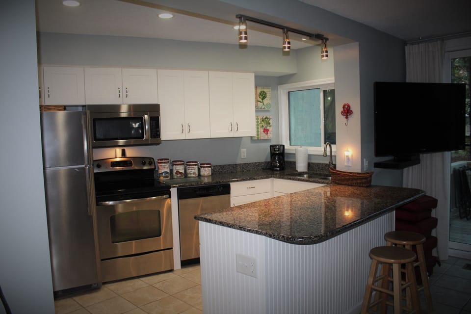 Kitchen well stocked with basic and specialty items