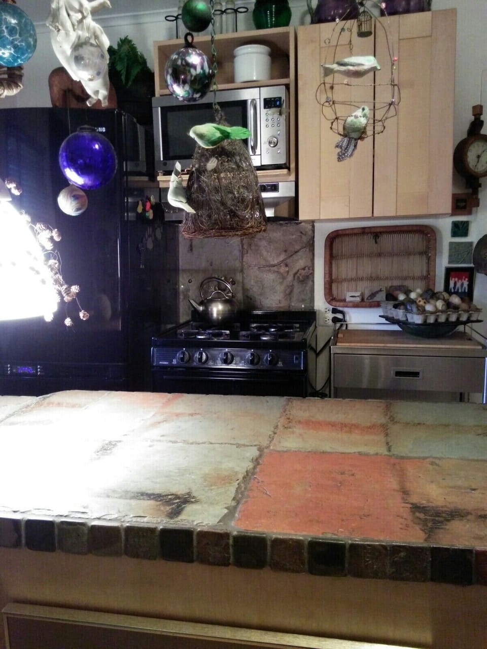 refrigerator, stove and mircowave overhead