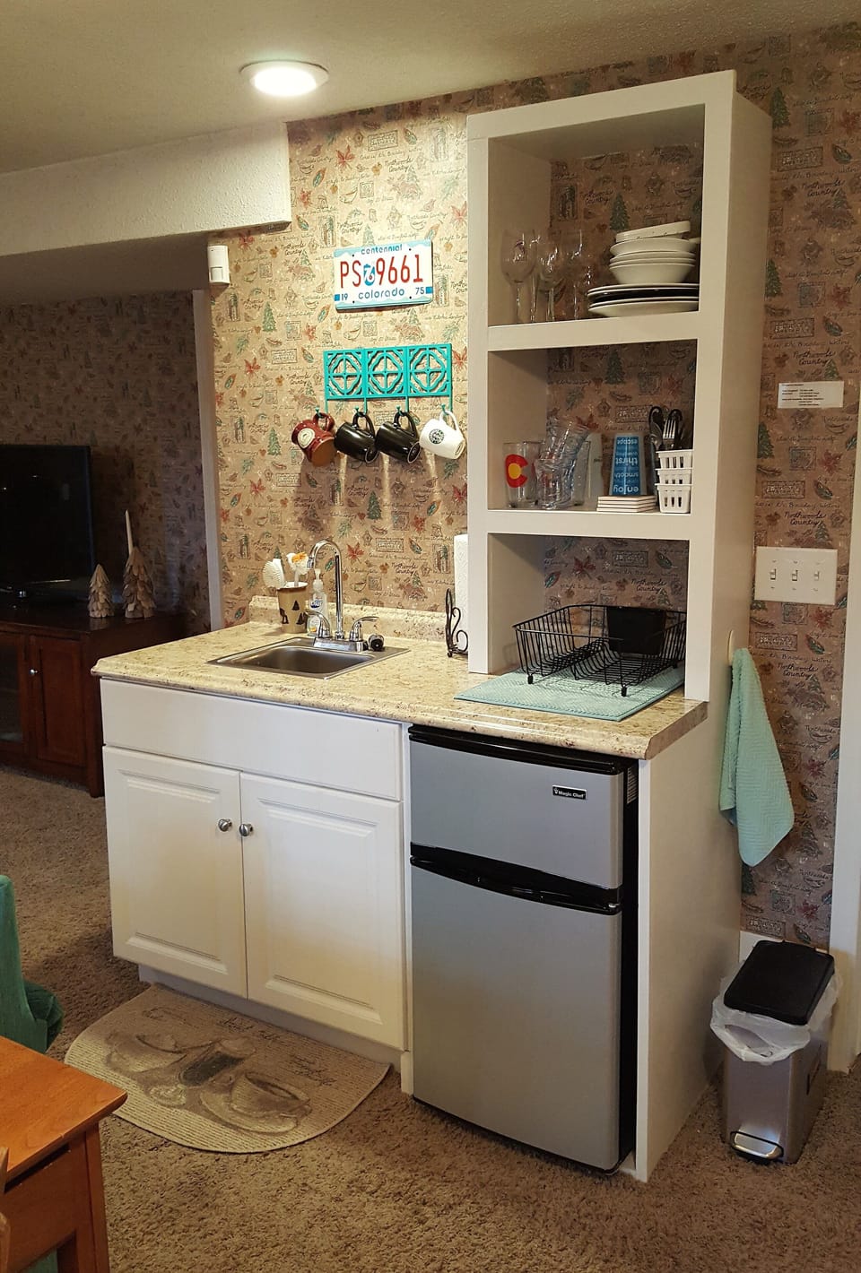 Fridge, sink, dishes, utensils, etc.