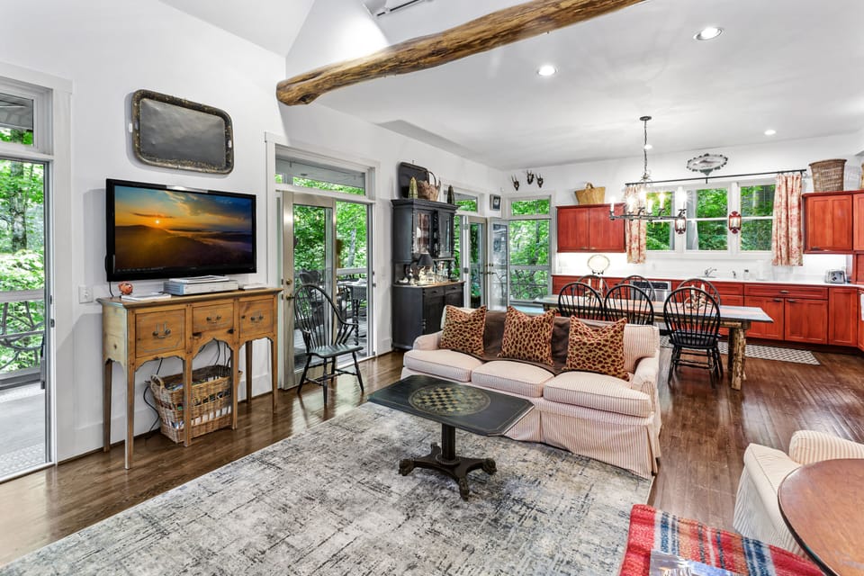 Love the vaulted ceilings and barn beam across ceiling