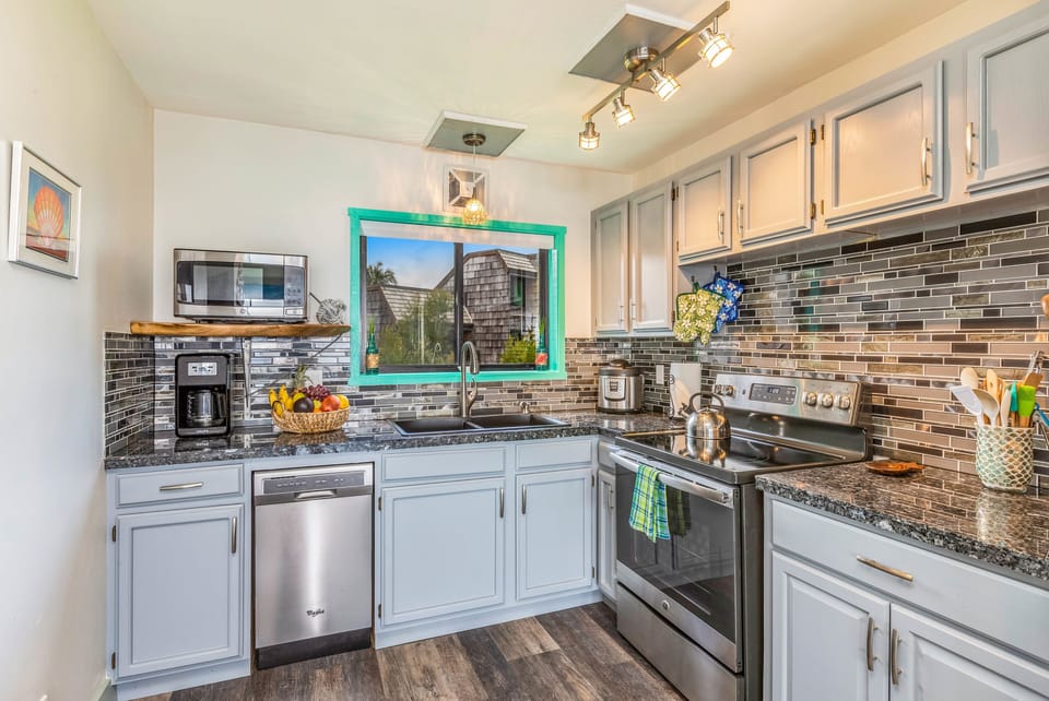 Completely updated kitchen, fully stocked for all your cooking needs. 