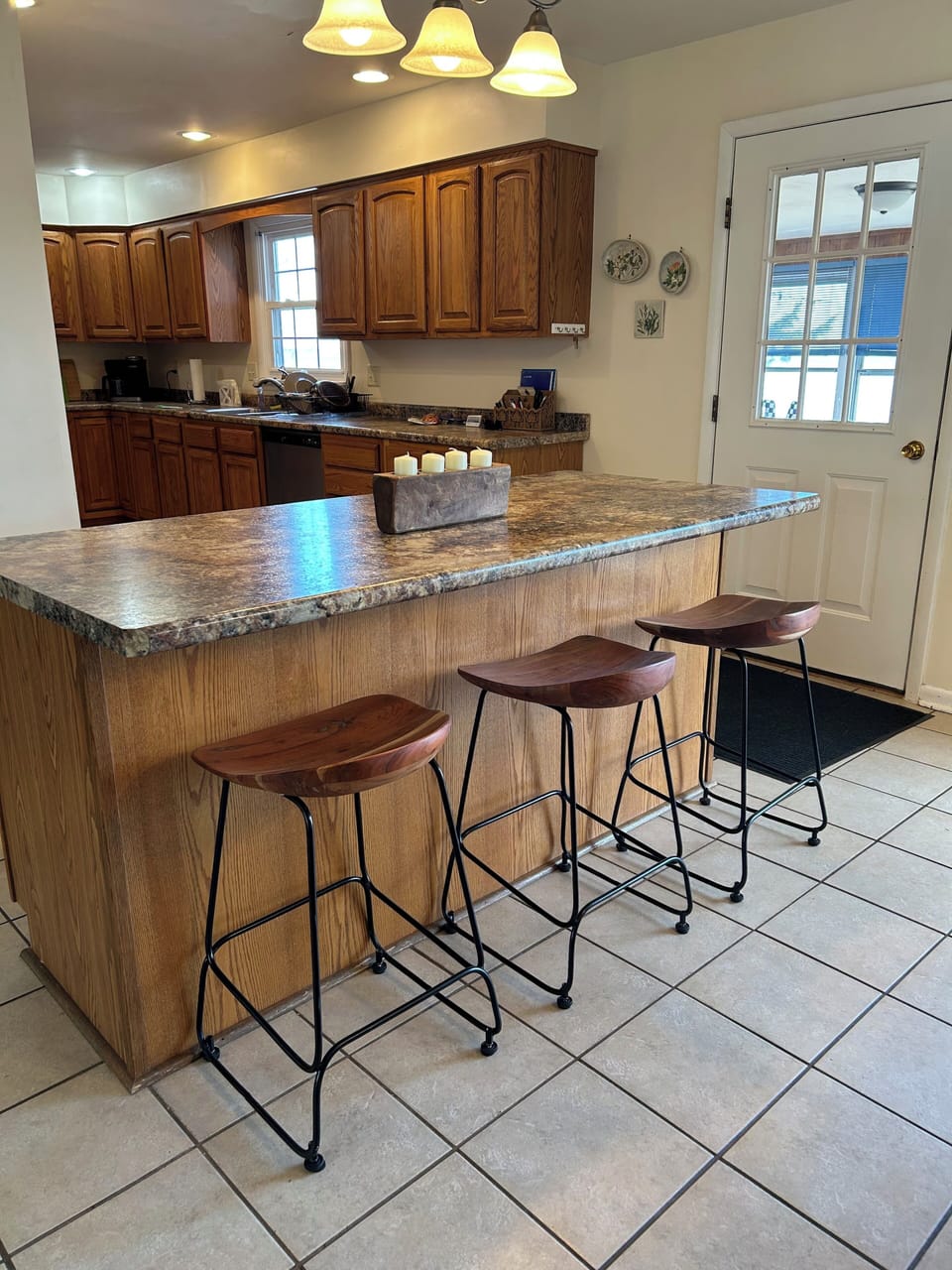 Extra seating can be found at the convenient island.