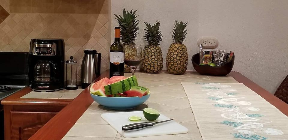 Wide bar. Visit with friends or family during meal preparation.