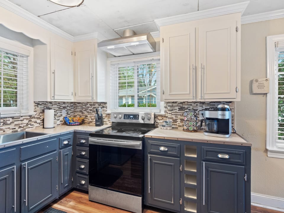 Kitchen with large refrigerator and duel coffee maker