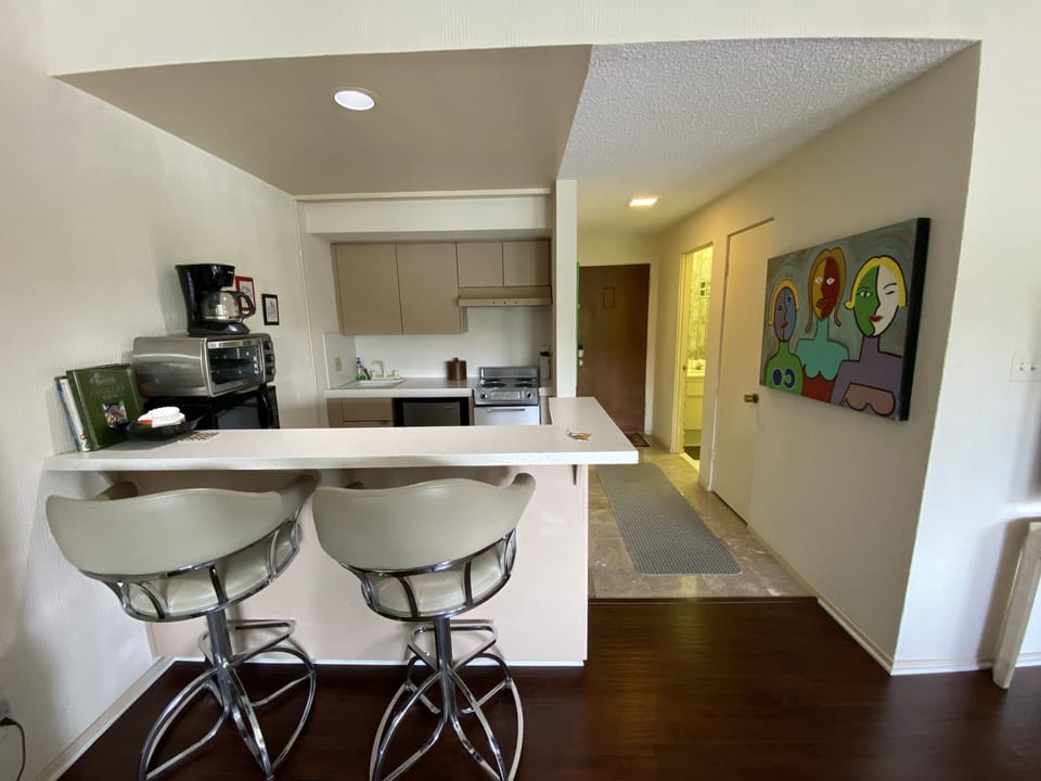 Kitchen and entry way to unit 