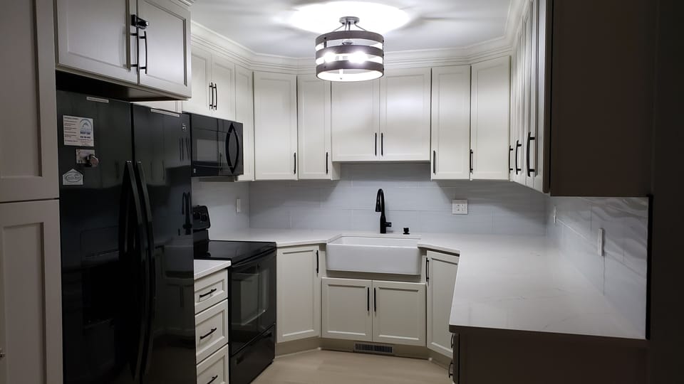 Full kitchen with filtered water in the refrigerator