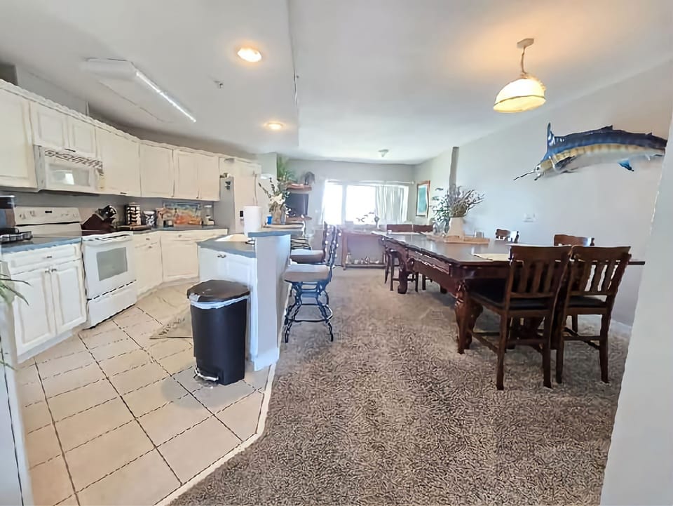 Living room  Dinning table set up-we can convert it to Pool table when requested