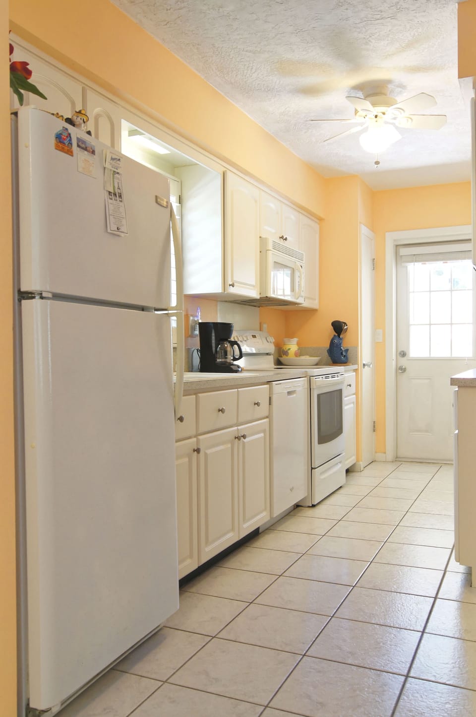 Gulf Cottage
Kitchen with Microwave,
Stove, Dishwasher and Fridge