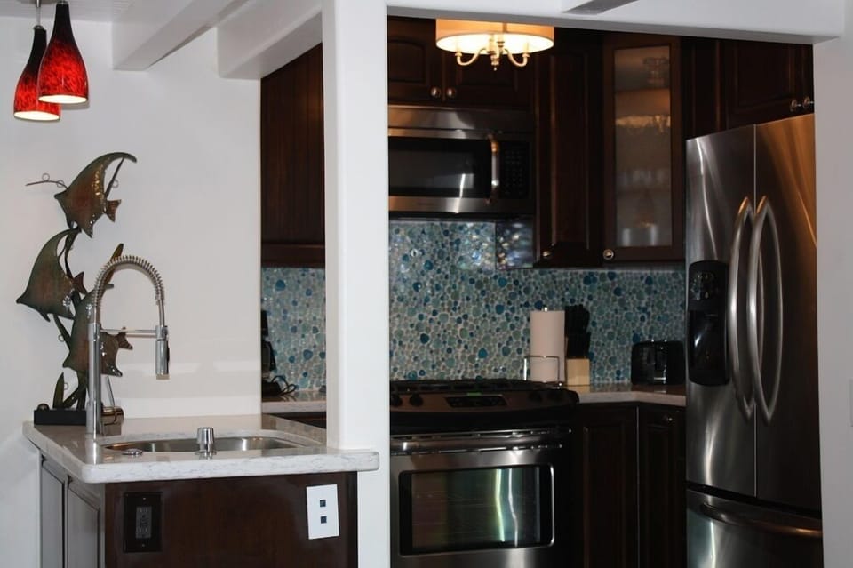 Fully equipped kitchen with brand new appliances and cabinetry 