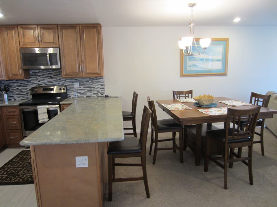 New dining room, table for six.  Also bar stool/chairs.