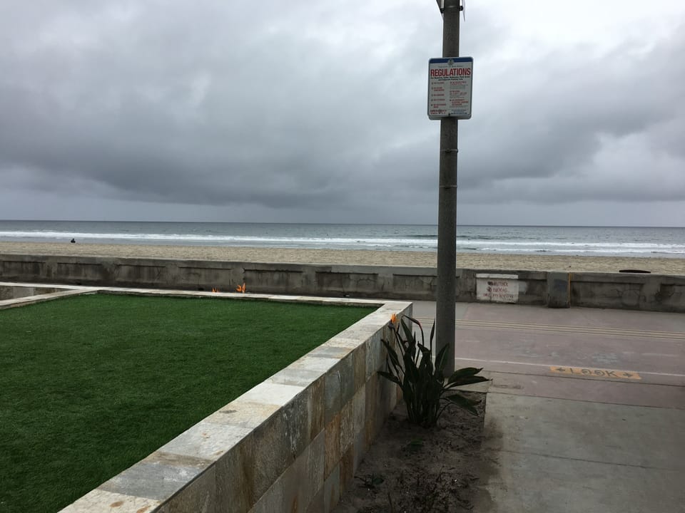 BEACH IN FRONT OF COURT