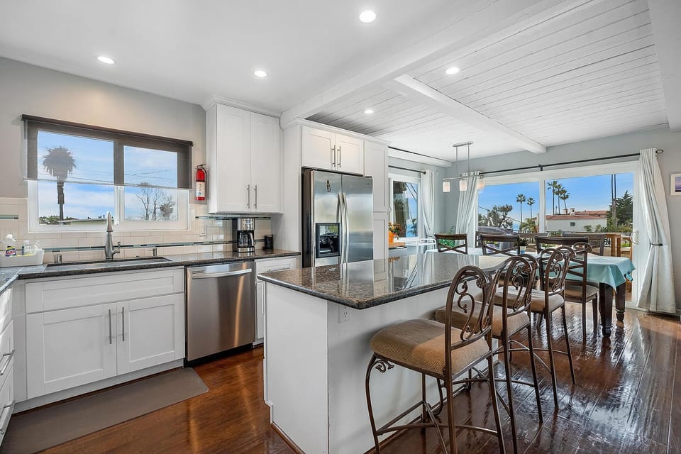 Kitchen, fully stocked, fridge, dishwasher, oven, gas range.  Open concept 