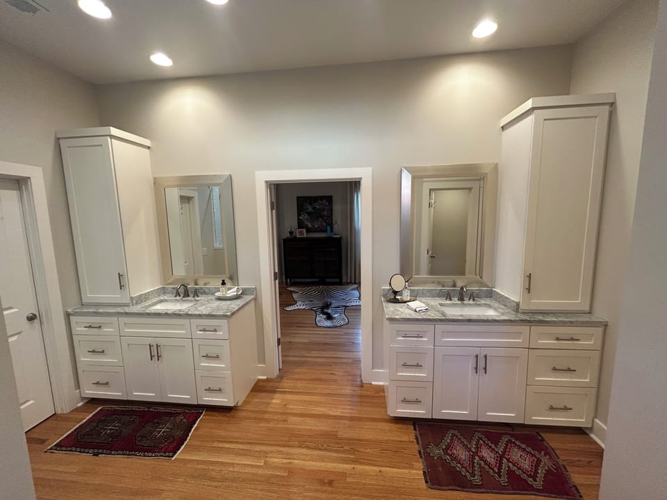 Primary Bathroom Double vanities.  