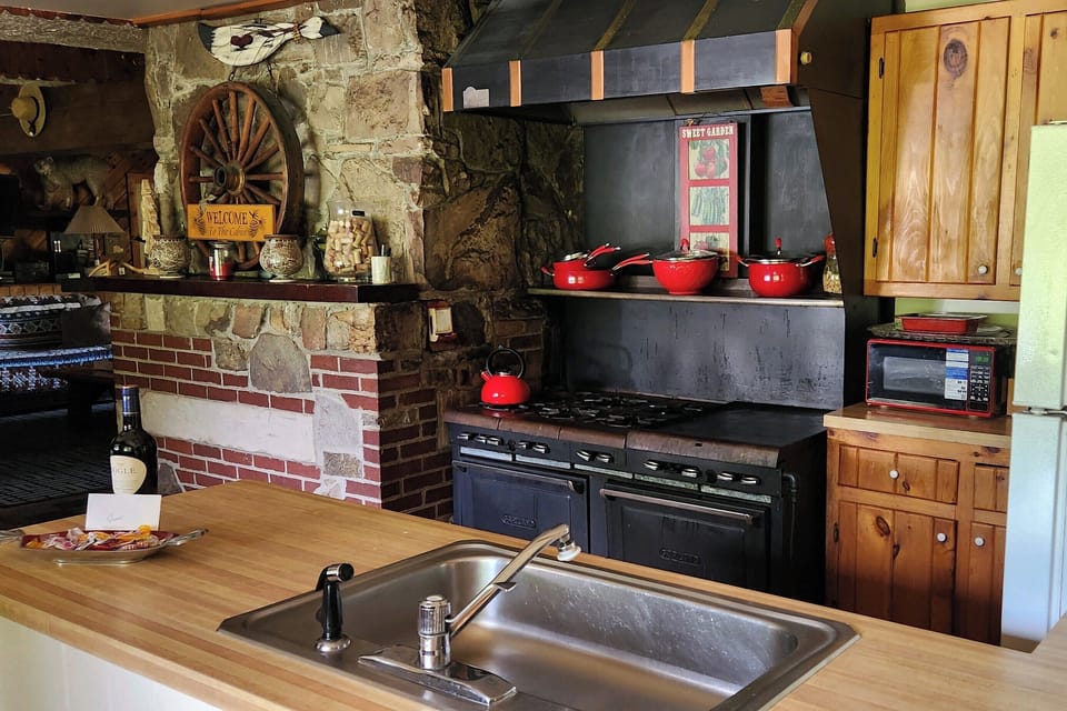 Kitchen, Gas Oven, Microwave, Coffee, Toaster, Stocked Cupboards and more! 