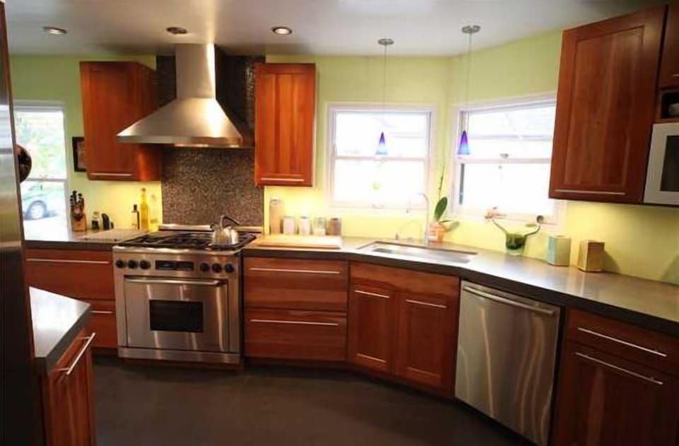 Gourment Kitchen with 6 burner Dacor Range, large 42" French door fridge. 