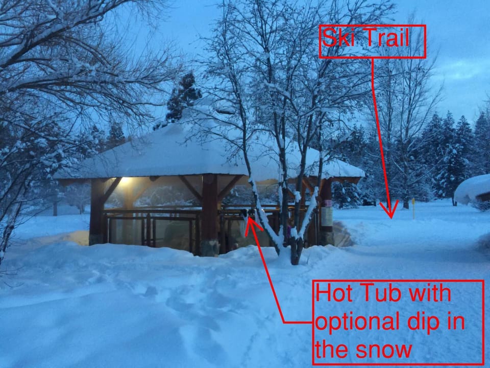 Sit in a hot tub and watch the skiers passing by
