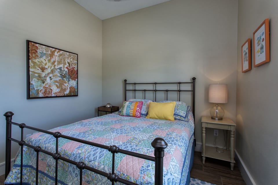 Comfy guest bedroom with queen bed.

