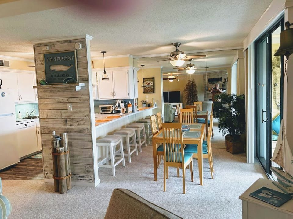 Open concept living room, kitchen, dining room