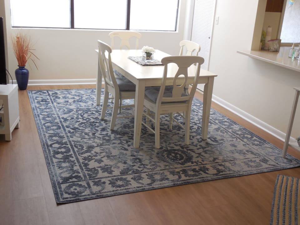 Dining  table  with seating for 6.  (2 folding chairs located in unit)