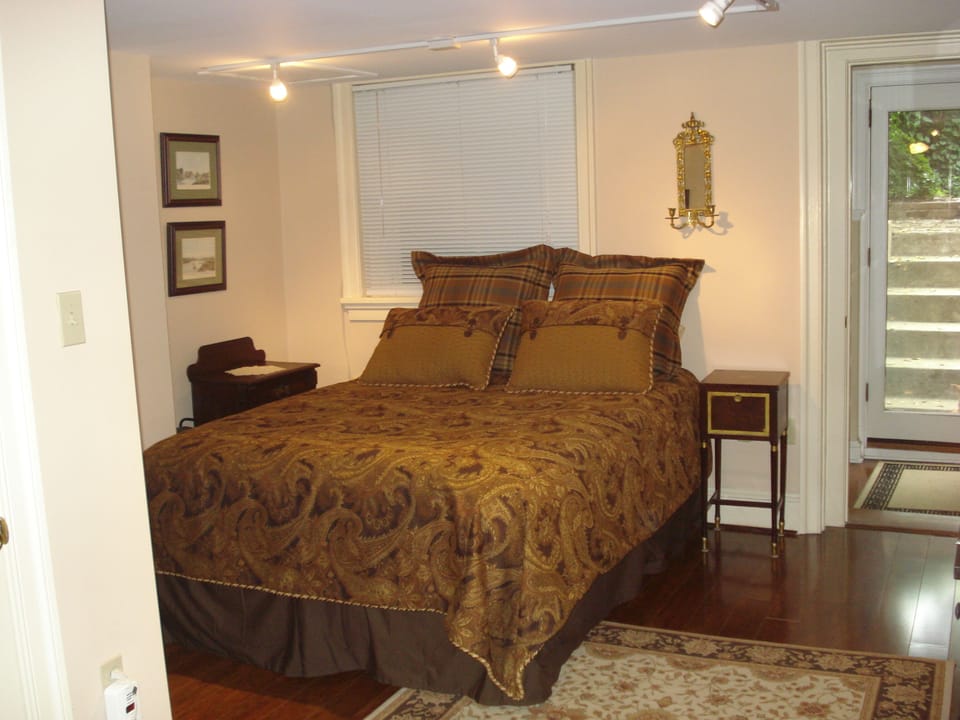 Queen sized bed beautifully furnished with fresh linens and huge closet 