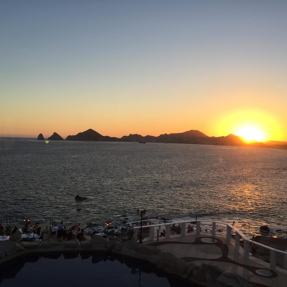 Sunset at Mona Lisa Restaurant looking back at Cabo San Lucas, a must see!