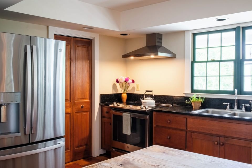 Large kitchen with lake views and pantry.