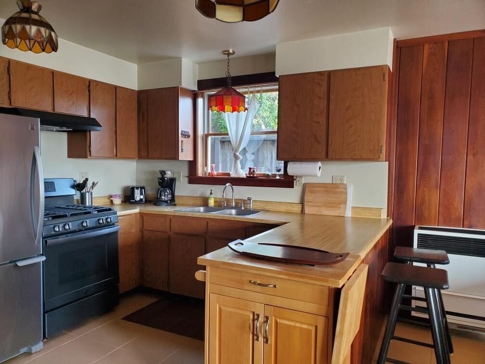 Kitchen & living room stay warm & toasty with propane heater between them!