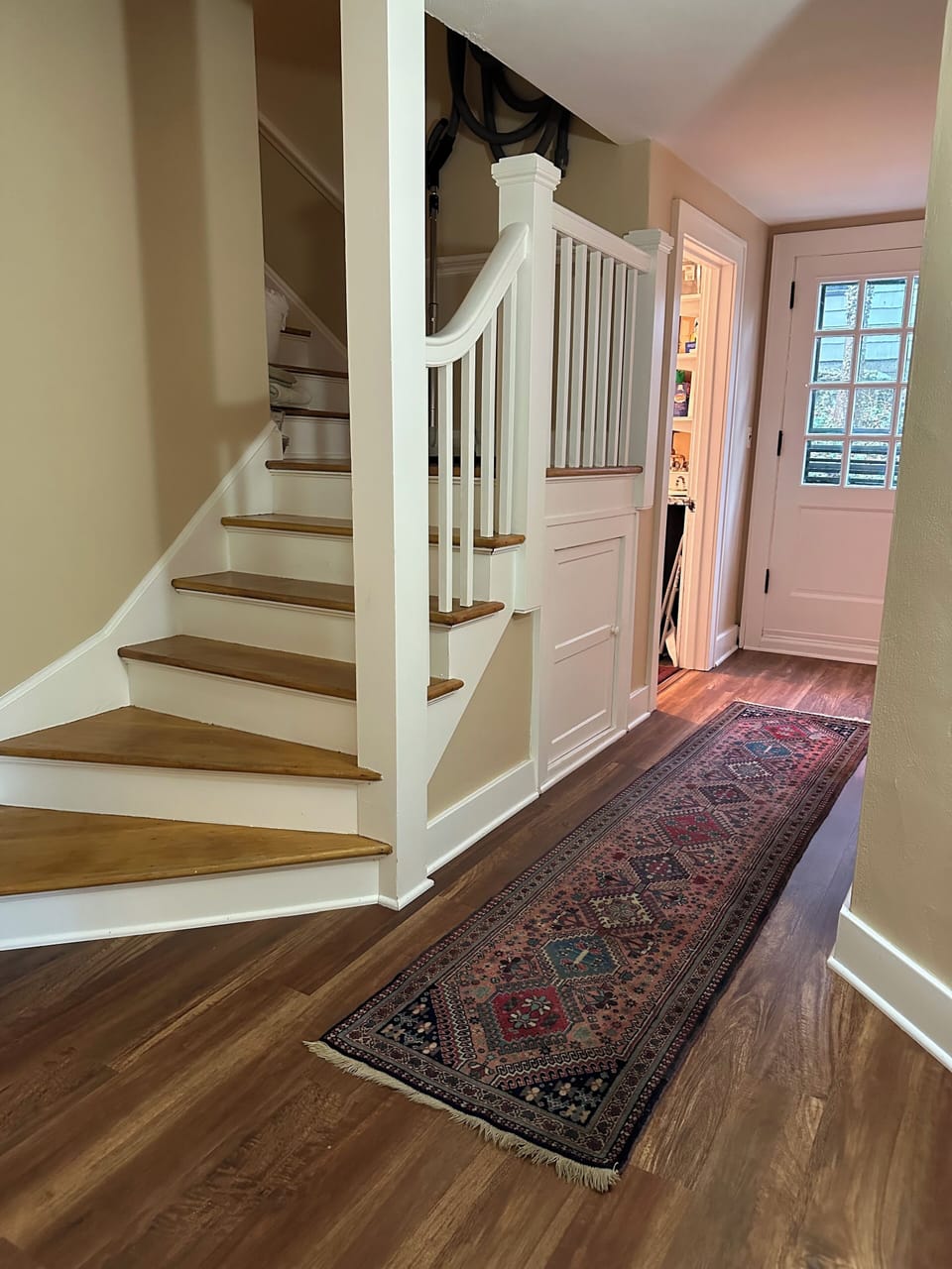 Hallway leading to laundry facilities (stairs are not part of rental)