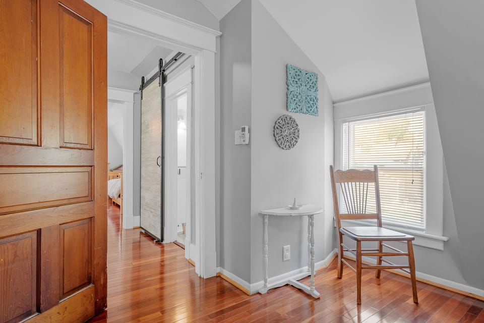 Queen bedroom #2 overlooks the backyard and is next to the bathroom