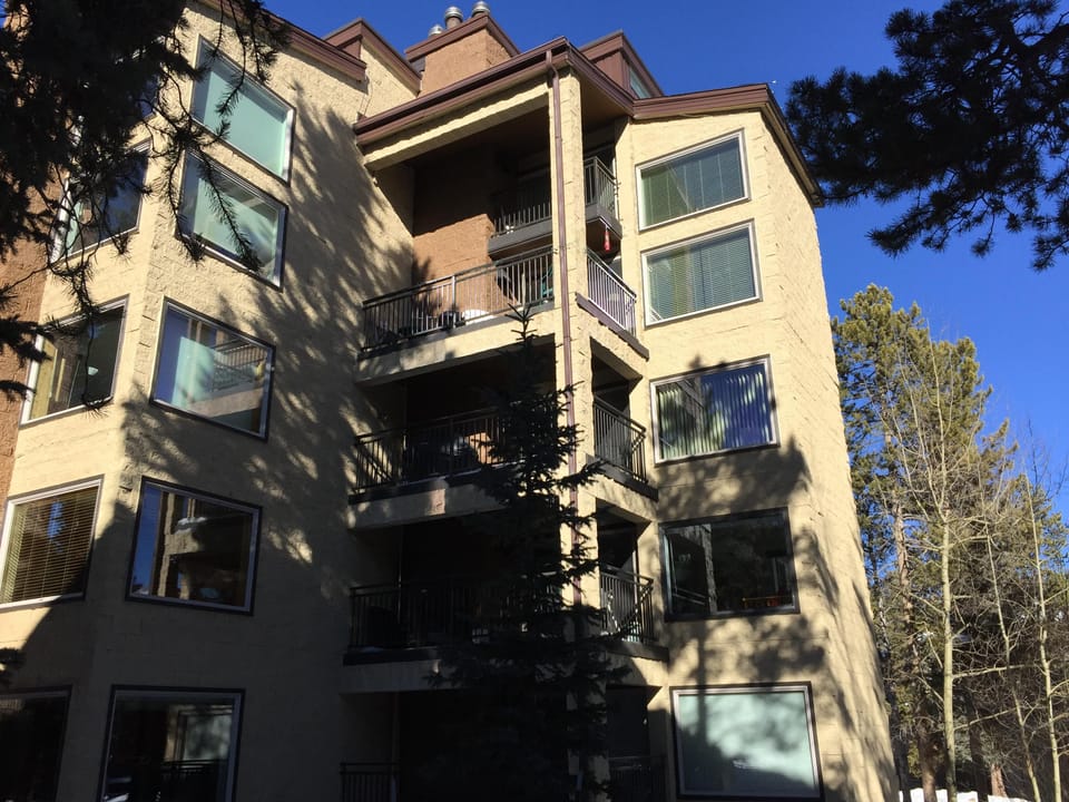 C405 - top 2 windows and double balcony. South Facing.