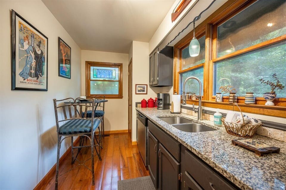 Updated kitchen with granite tops and stainless appliances