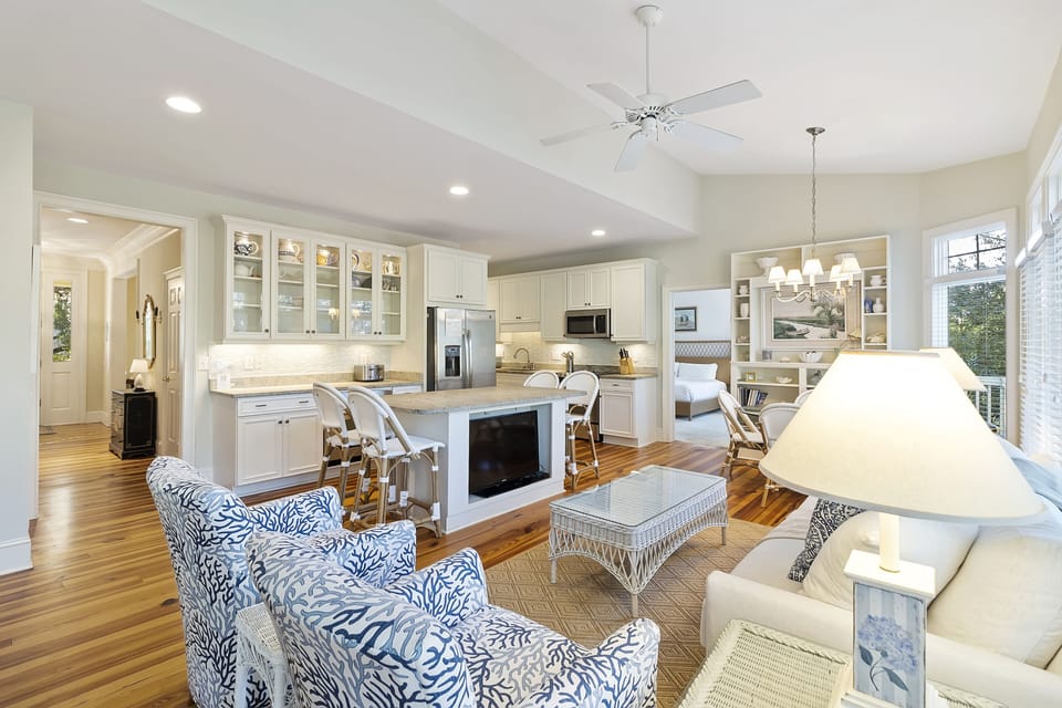 Kitchen with seating area and TV.