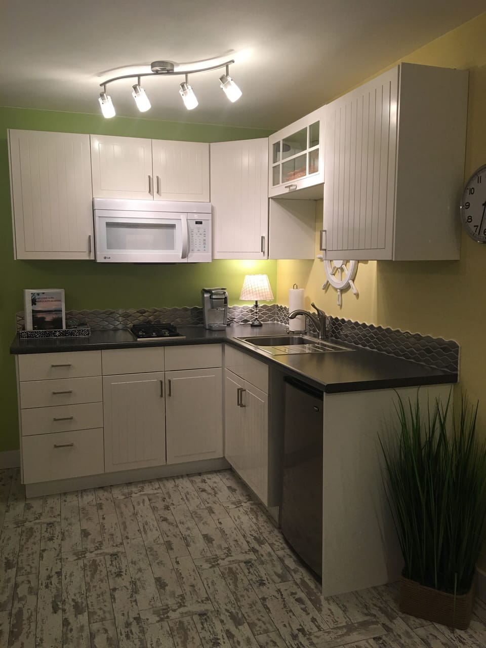 Efficient kitchen with coffee maker, Microwave, two burner stove, refrig