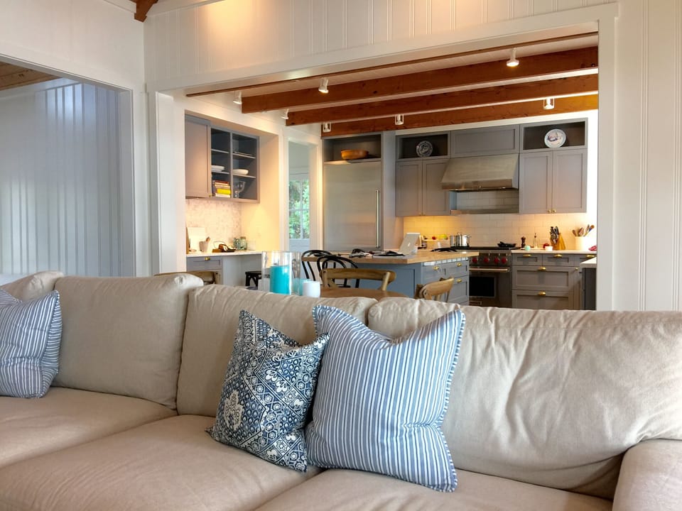 Living Room Sectional Couch with Kitchen in the background