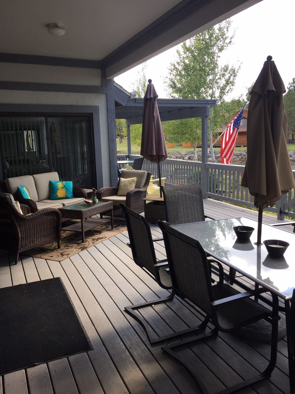 Table and seating area overlooking lake