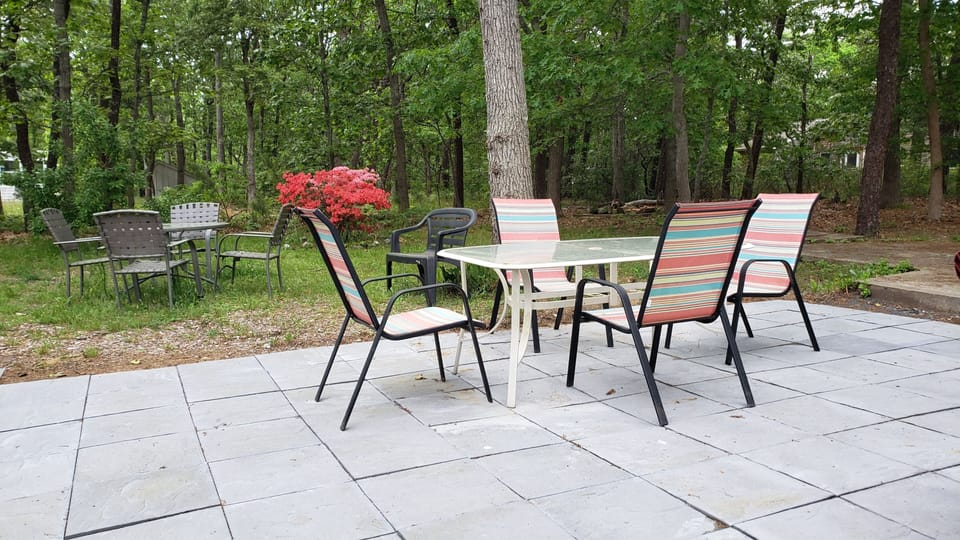 Another view of the large back patio and more outdoor seating.