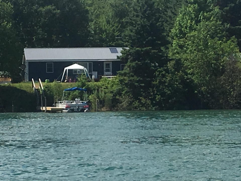 The house from the water!  Bring tents for extra room or shade! 