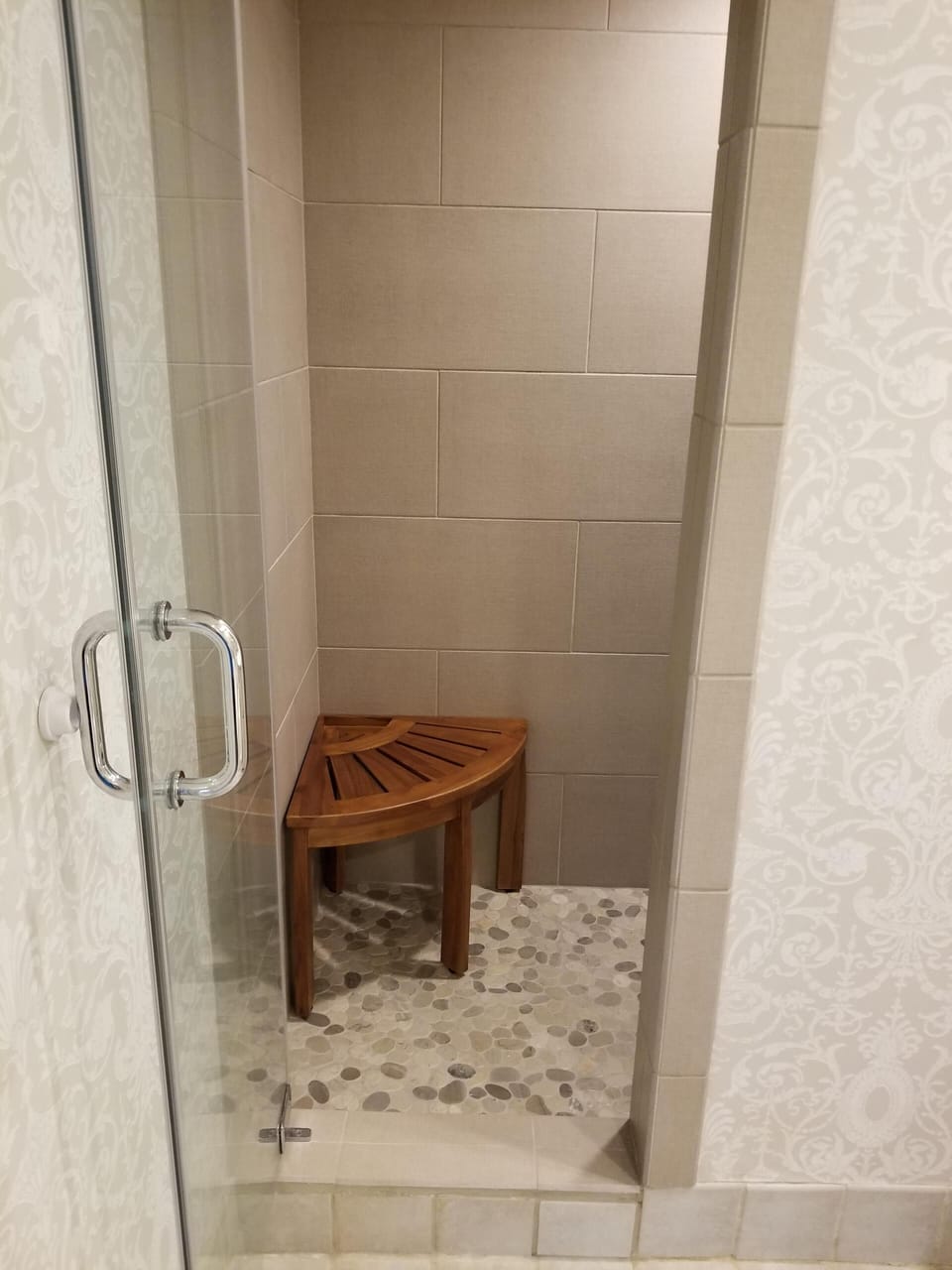 Newly tiled Walk in shower with hand held shower head