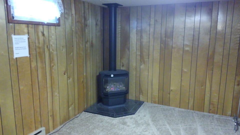 Basement Gas Fired Fire Place 
Plenty of space to dry off that Ski gear 