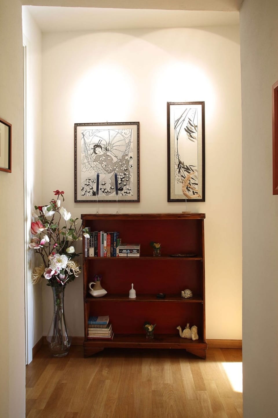 The hallway to main bath room and laundry room (left) the main bedroom (right)