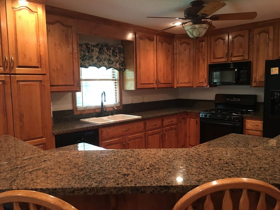 Kitchen on main level - fully stocked with dishes, utensils, pots and pans.