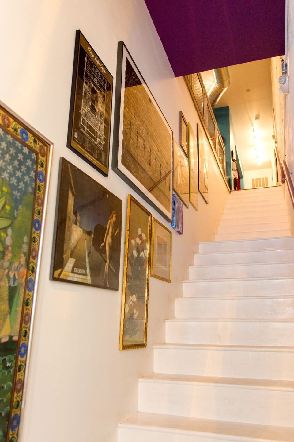 The loft awaits!  Enjoy the artwork on your way up.
