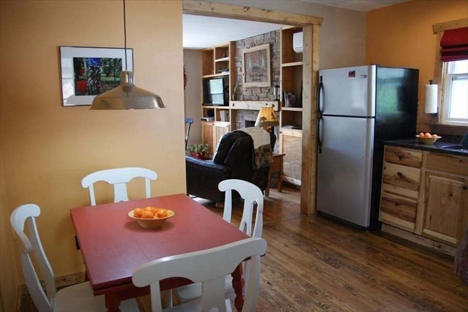 View to living room from kitchen Updated kitchen with granite countertops