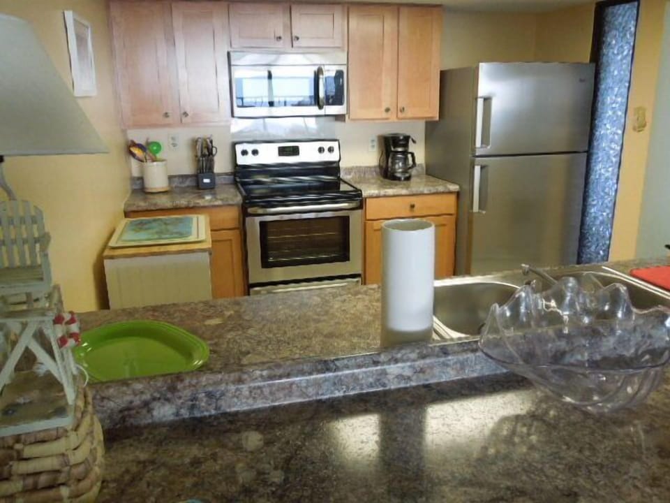All new SS appliances, new cabinets, tiled floors, bake ware, griller. 