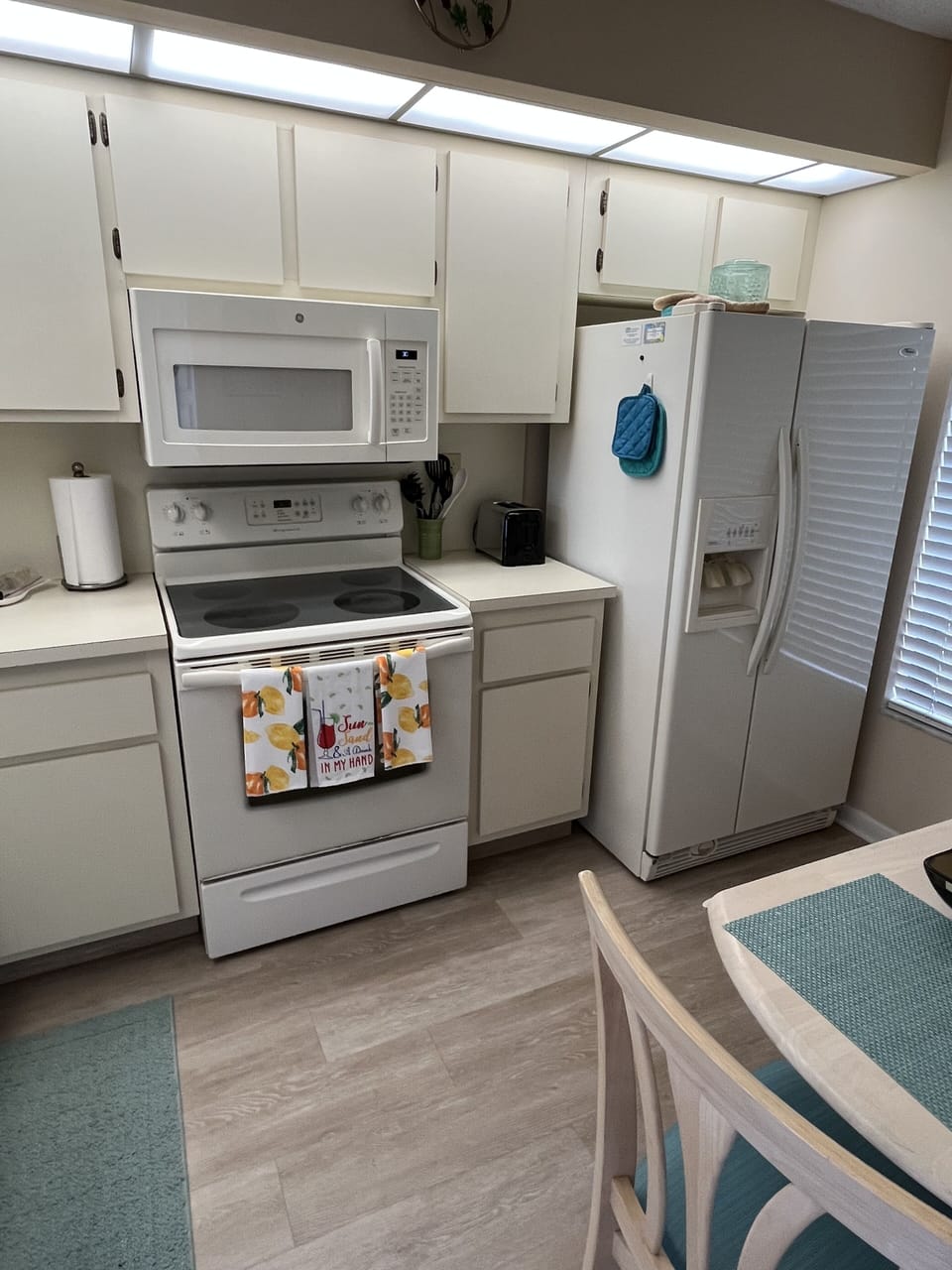 Kitchen with Side by side frig with ice & water dispenser 