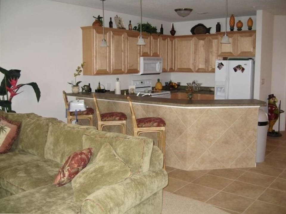 Kitchen with breakfast bar, loaded with the conveince of home.