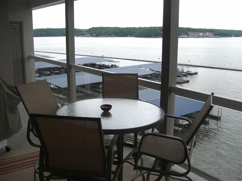 Large covered patio with gas grill