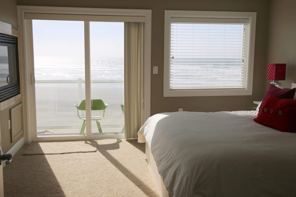 Master bedroom and its balcony.