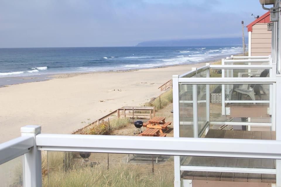View to the north from a balcony. (Miles of smooth beach.)