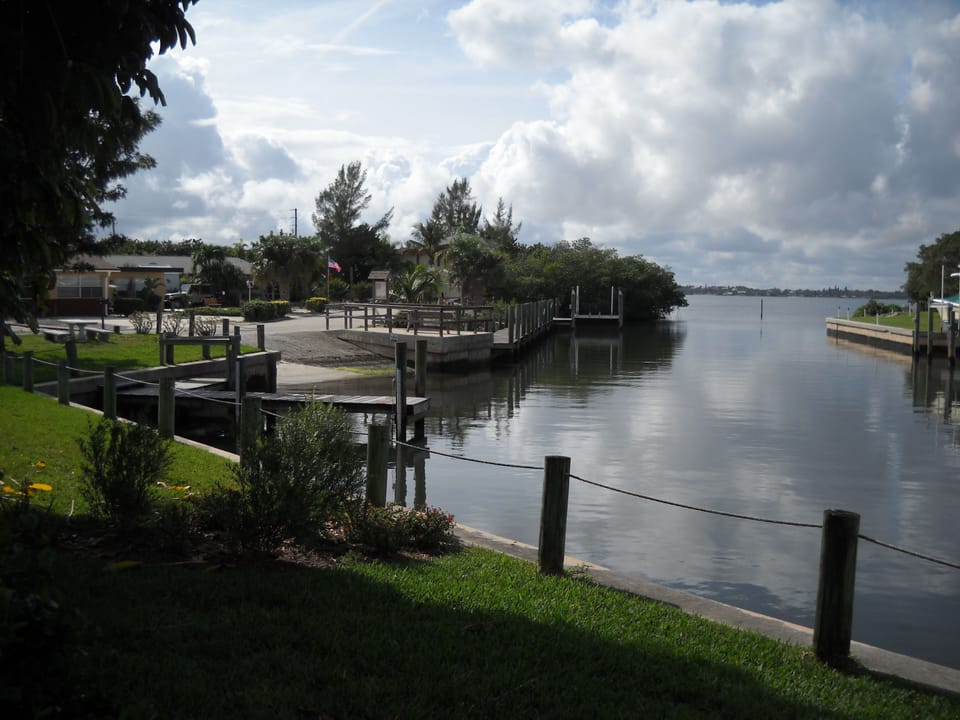 Boat ramp and fish cleaning station at back of neighborhood on the river
